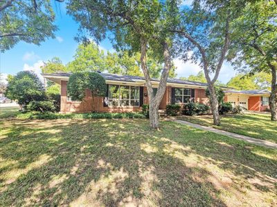 Treed shaded landscaped lot. | Image 2