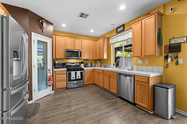 7221 Windswept Loop, House other with 4 bedrooms, 3 bathrooms and 2 parking in Sparks NV | Image 7