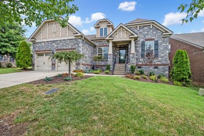 Welcome to 209 Foxley Ct, Nolensville. An all brick home by Drees Home - The Millington floor plan. | Image 1