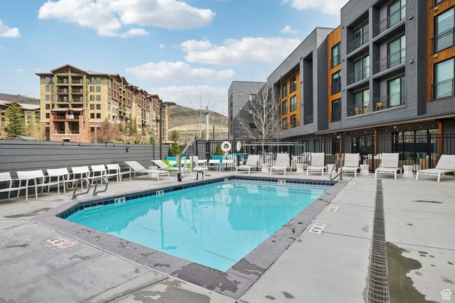 Pool featuring fence and a patio | Image 30