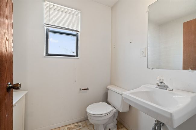 Convenient half bath on first floor | Image 11