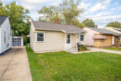 View of front facade with a front lawn | Image 2