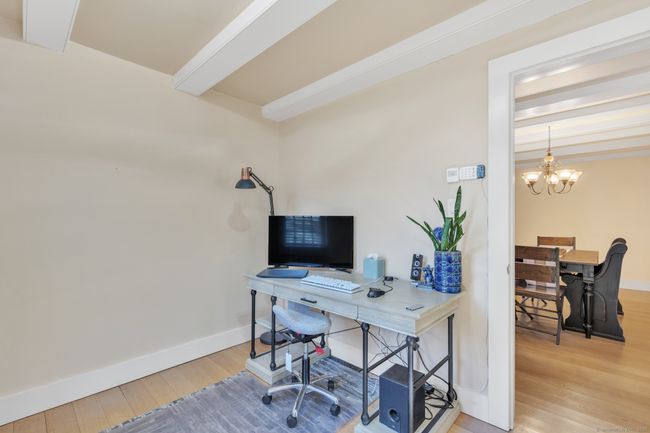 Bedroom main level currently used as an office | Image 14