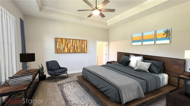 Spacious main-level primary bedroom and suite, with some furnishing suggestions. | Image 7