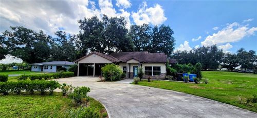 1205 E Knights Griffin Rd, Plant City, FL, 33565-2407 | Card Image