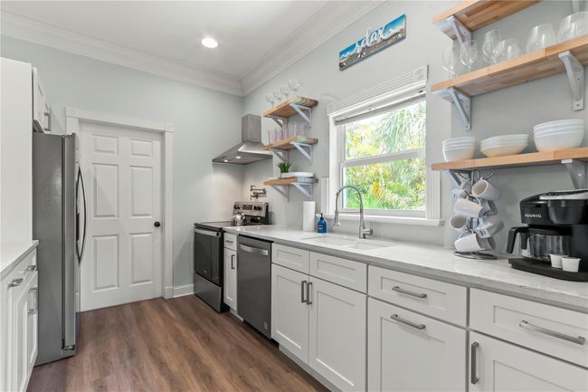 Remodeled kitchen w/ floating shelves and soft close cabinets/drawers | Image 11