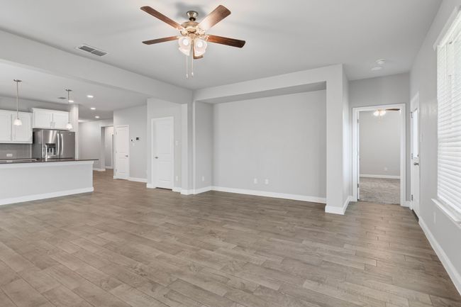 Living Space w Primary Bedroom Through Door on the Right | Image 12