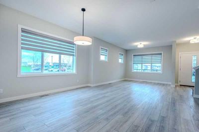 275 Wolf Creek Way Se, Home with 5 bedrooms, 3 bathrooms and 2 parking in Calgary AB | Image 3