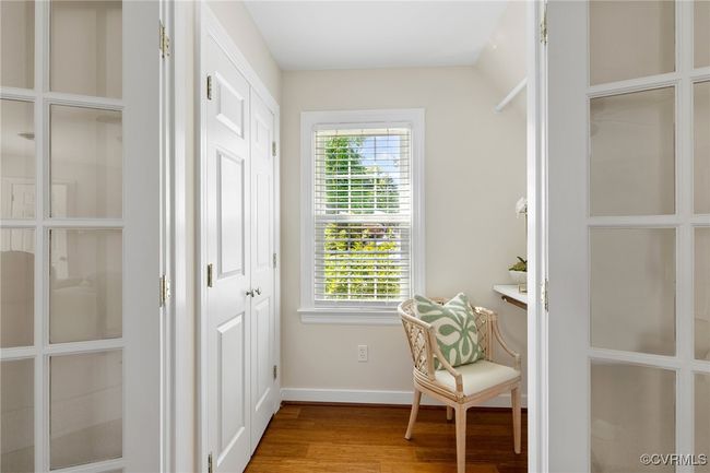 Closet and work/hobby area off Primary bedroom. | Image 28