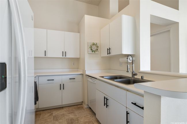 Bright, light kitchen with lots of storage space. Dishwasher included! | Image 14
