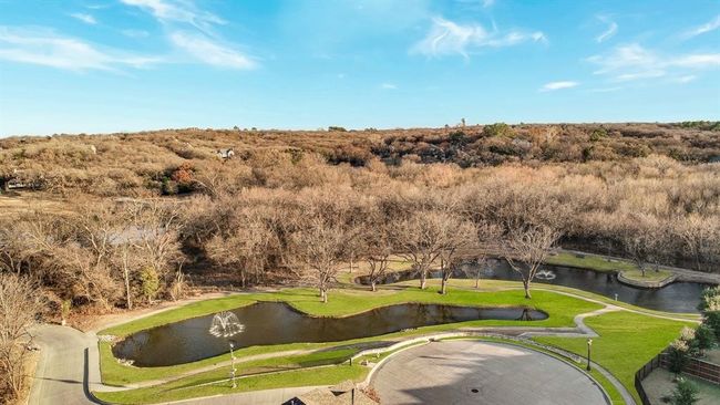 View of community featuring a water view and a yard | Image 33