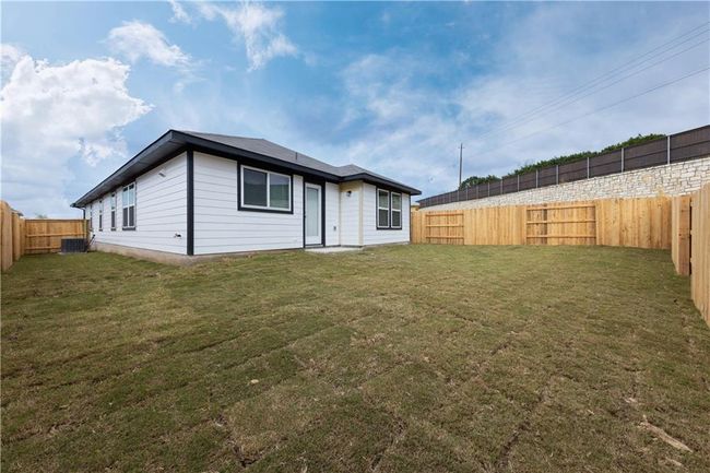 Rear view of property featuring cooling unit | Image 18