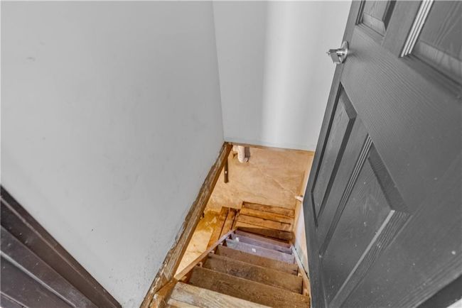 View of stairway leading to basement | Image 44