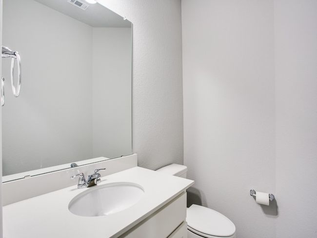 Half bath with toilet and vanity | Image 9