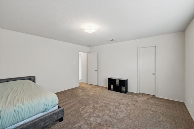 Bedroom featuring carpet floors and baseboards | Image 22