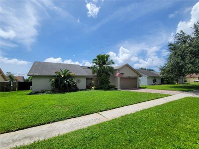 8300 Nw 51st Ct, House other with 4 bedrooms, 2 bathrooms and null parking in Lauderhill FL | Image 1