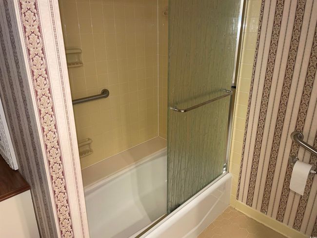 Full bath featuring vanity and wallpapered walls | Image 16