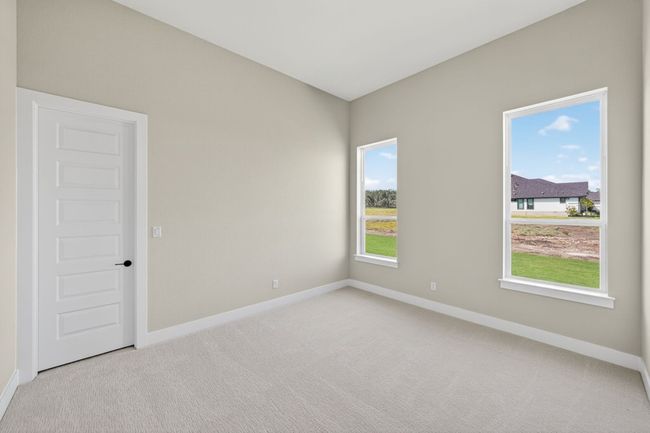 Unfurnished room featuring carpet flooring and baseboards | Image 20