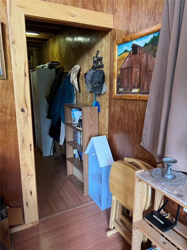 another hallway view leading to utility room and bathroom | Image 58