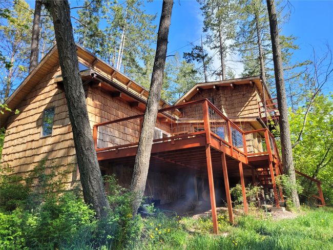 Back of property featuring a wooden deck | Image 101