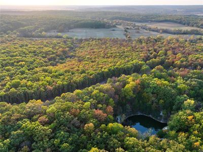 Bird's eye view with a water view | Image 1