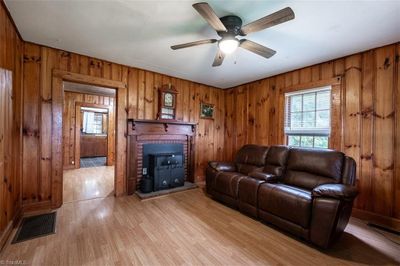 Living room with wood stove | Image 3