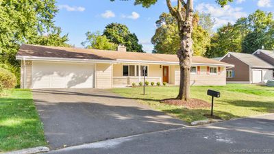 Maintenance, free vinyl siding, new gutters, new front door, and lighting | Image 2