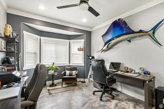 Office space featuring ornamental molding, ceiling fan, healthy amount of natural light, and recessed lighting | Image 50