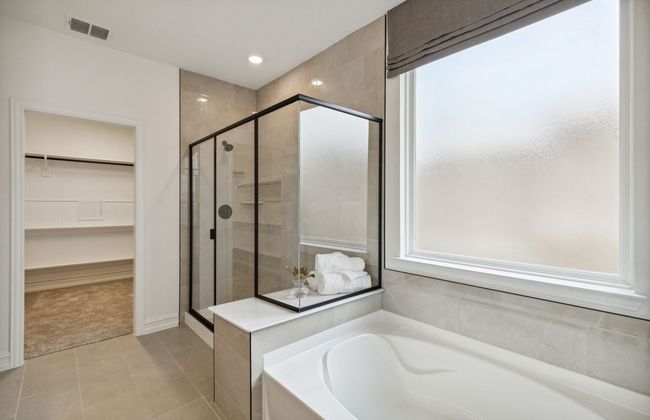 Oversized shower *Photos of furnished model. Not actual home. Representative of floor plan. Some options and features may vary | Image 11