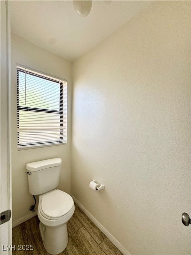 Bathroom featuring wood tiled floors | Image 19
