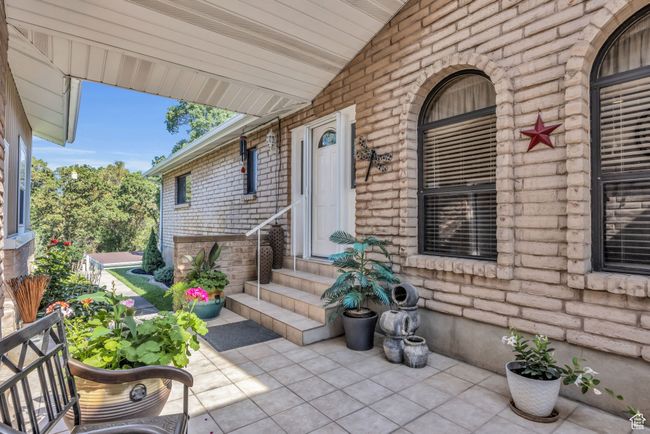 Property entrance featuring brick siding | Image 5