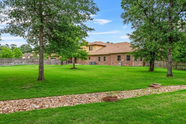 28002 Whispering Maple Way, House other with 5 bedrooms, 5 bathrooms and 3 parking in Spring TX | Image 12