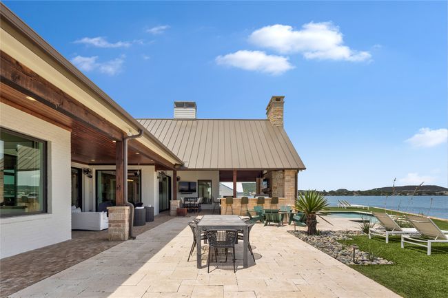 View of patio featuring outdoor lounge area and a water view | Image 33