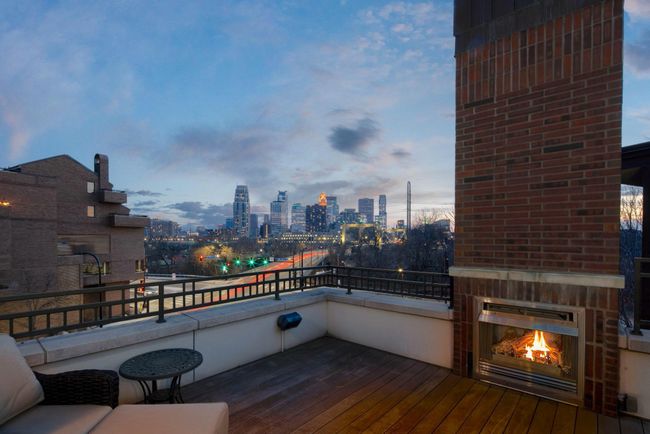 Private rooftop deck with gas fireplace & connected to the home sound system | Image 48
