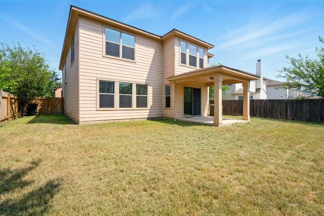 Rear view of property featuring a patio | Image 19
