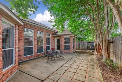 Perfect, low-maintenance backyard gives you plenty of room for outdoor entertaining on the patio. | Image 2