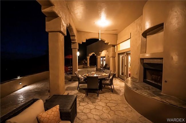 View of patio with french doors and outdoor dining space | Image 23