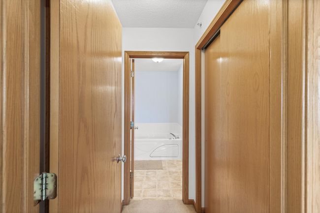 From the primary bedroom to the bathroom | Image 18