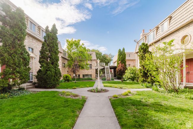 View of property's community with a yard | Image 21