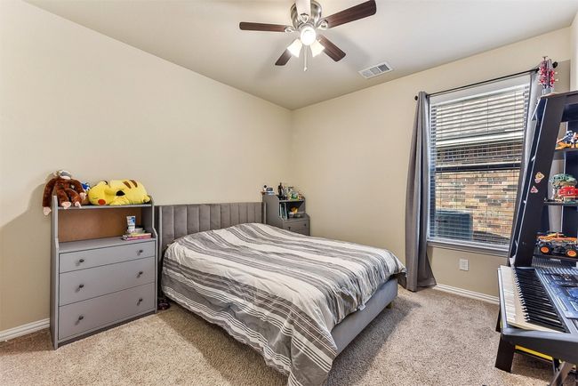 Whether used as bedrooms or flex spaces, the secondary rooms are well-sized and thoughtfully placed for added privacy | Image 26