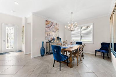 Dining Room with chandelier. | Image 3