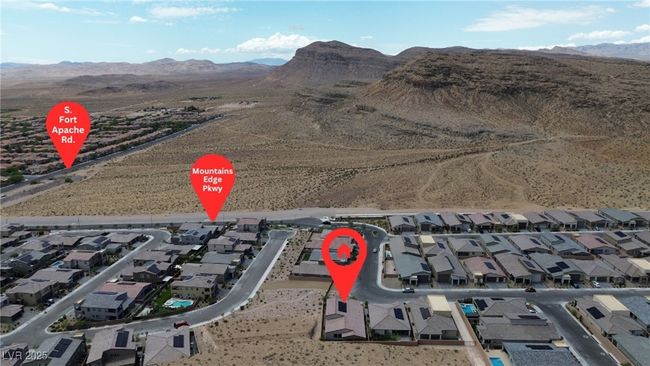 Aerial perspective of suburban area with a mountainous background | Image 35