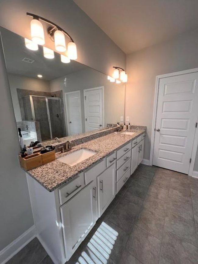 1935 Manor Pointe Dr, Condo with 3 bedrooms, 3 bathrooms and null parking in Cumming GA | Image 30