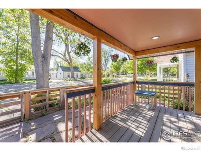 Sweet wraparound porch beckons neighborly conversations | Image 3