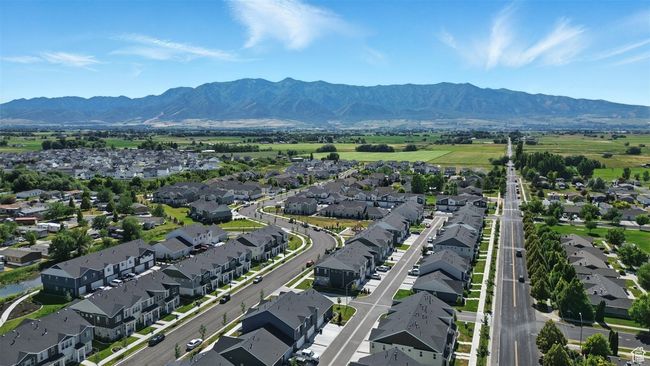 Aerial view of residential area featuring a mountain backdrop | Image 30