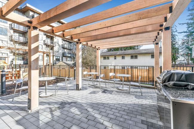 View of patio / terrace featuring fence, a pergola, and a grill | Image 34