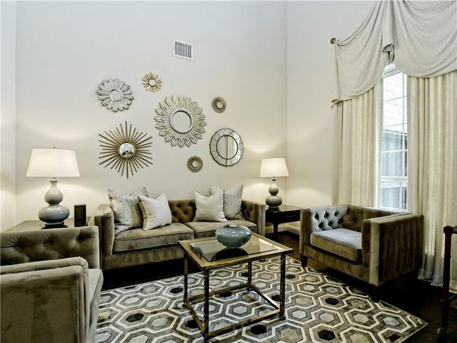 Living area with wood finished floors | Image 14