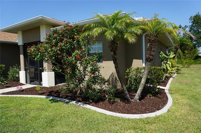 Lush tropical landscaping around home | Image 41