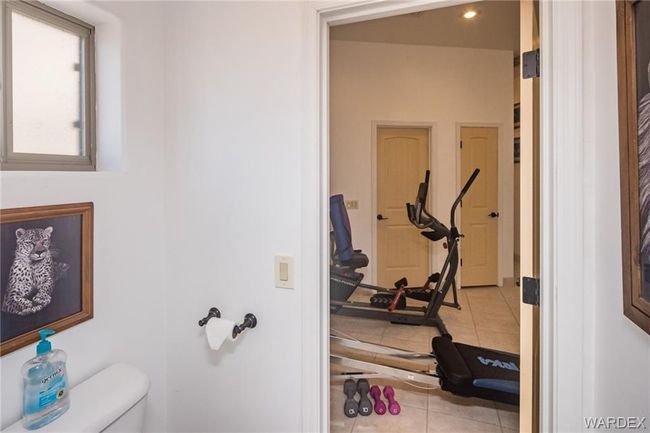 Bathroom featuring tile patterned flooring and toilet | Image 67