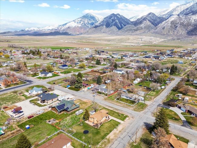 Drone / aerial view featuring a mountain view and a residential view | Image 9